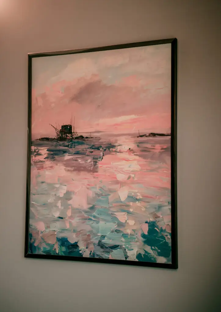 Framed painting on wall